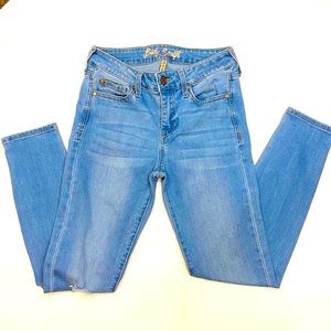 Celebrity Pink Destructed Skinny Jeans